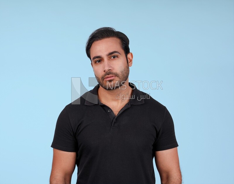 Portrait Of Handsome man Standing, Smiling Man, Wearing Casual Clothes Posing In a Light Room Interior, Smiling At the Camera