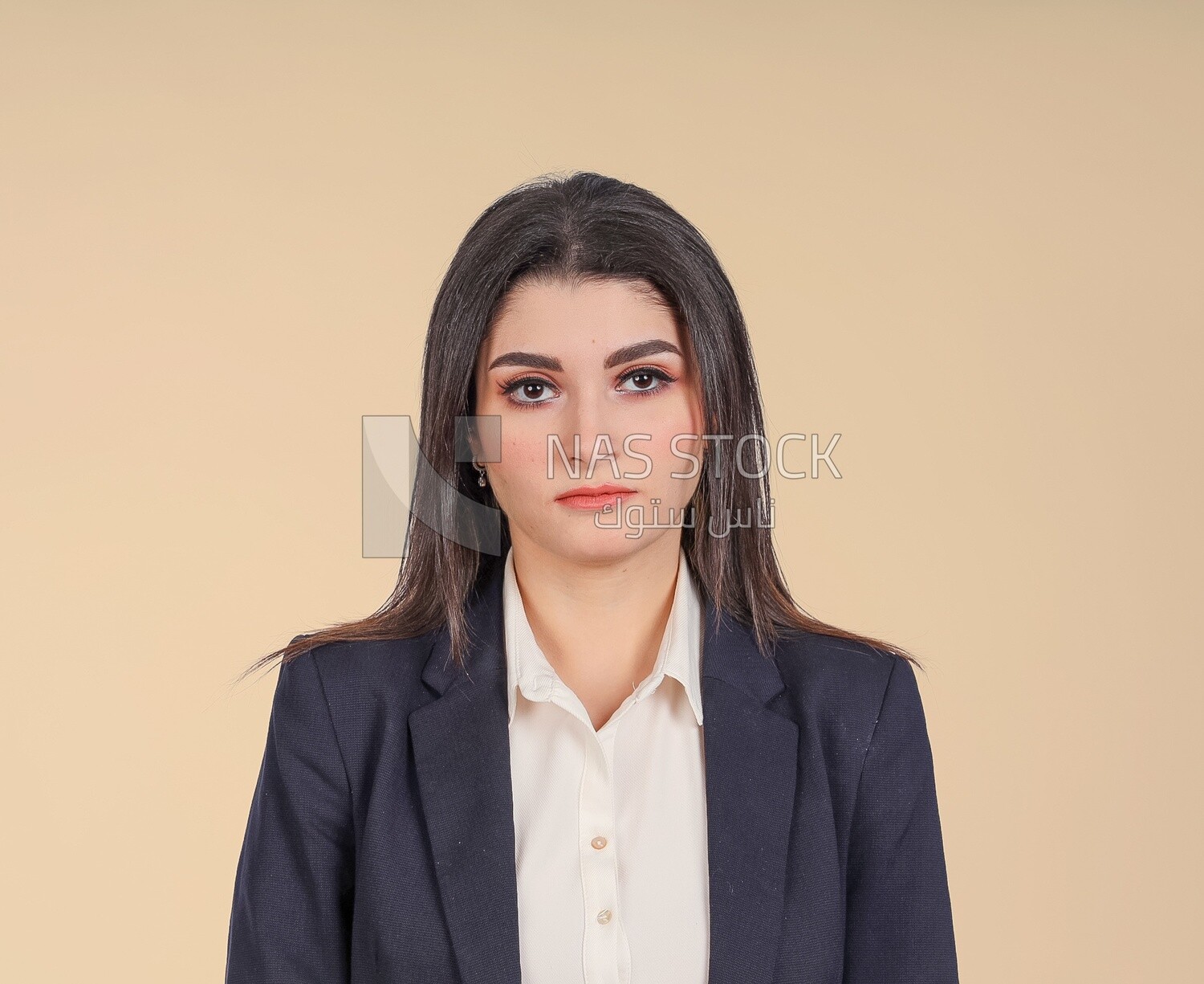 Portrait of a businesswoman standing, meeting at the workplace, discussing work tasks, taking notes on the board