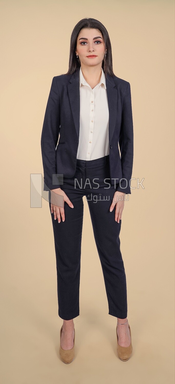 Photo of a businesswoman standing, meeting at the workplace, discussing work tasks, taking notes on the board