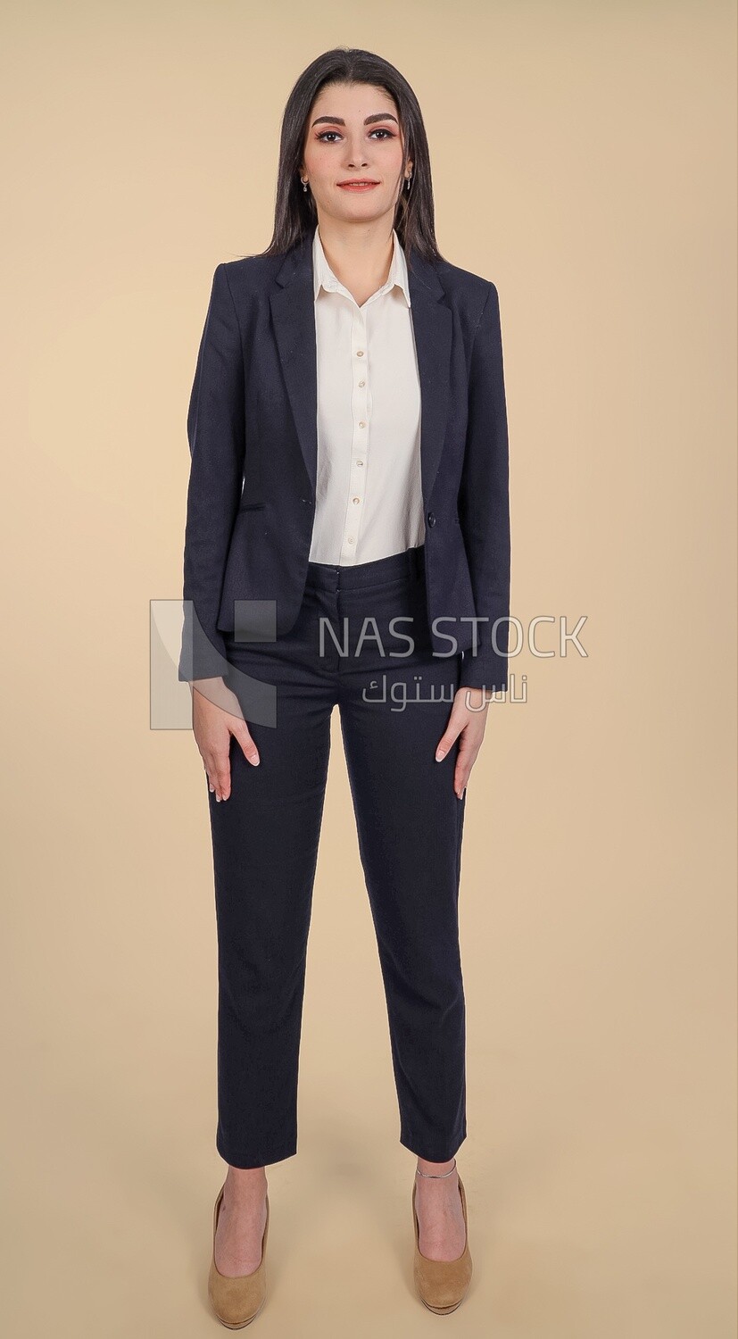 Photo of a businesswoman standing, meeting at the workplace, discussing work tasks, taking notes on the board