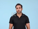 Portrait Of Handsome man Standing, Smiling Man, Wearing Casual Clothes Posing In a Light Room Interior, Smiling At the Camera