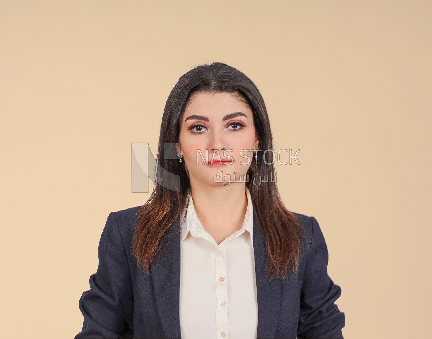 Portrait of a businesswoman standing, meeting at the workplace, discussing work tasks, taking notes on the board