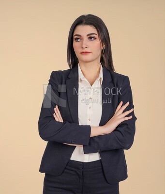 Photo of a businesswoman standing with crossed hands, meeting at the workplace, discussing work tasks, taking notes on the board
