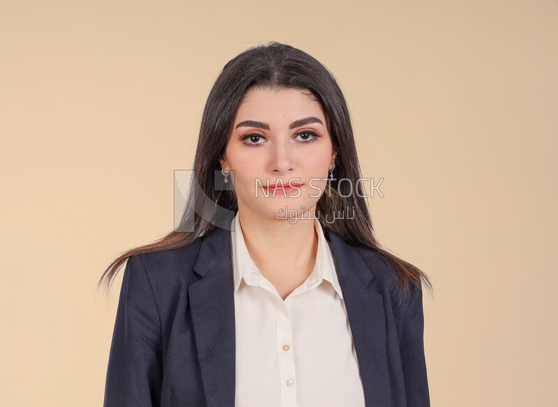 Portrait of a businesswoman standing, meeting at the workplace, discussing work tasks, taking notes on the board