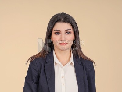 Portrait of a businesswoman standing, meeting at the workplace, discussing work tasks, taking notes on the board