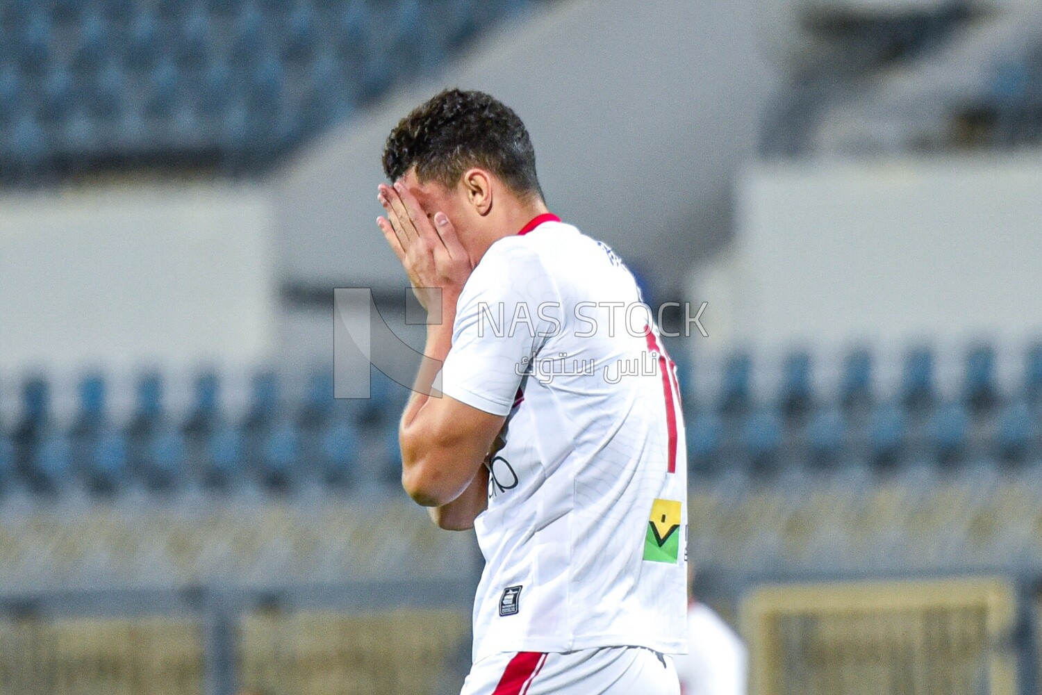 Football player who feels let down by defeat