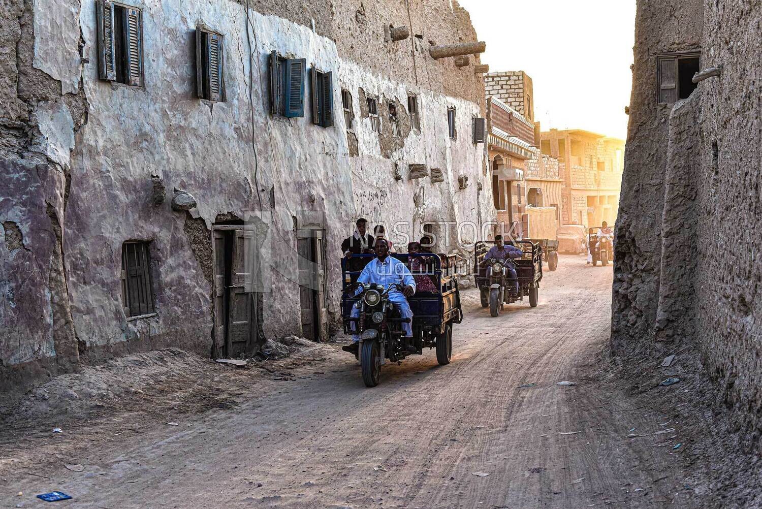 A tricycle running through the streets of Siwa Oasis, Egypt