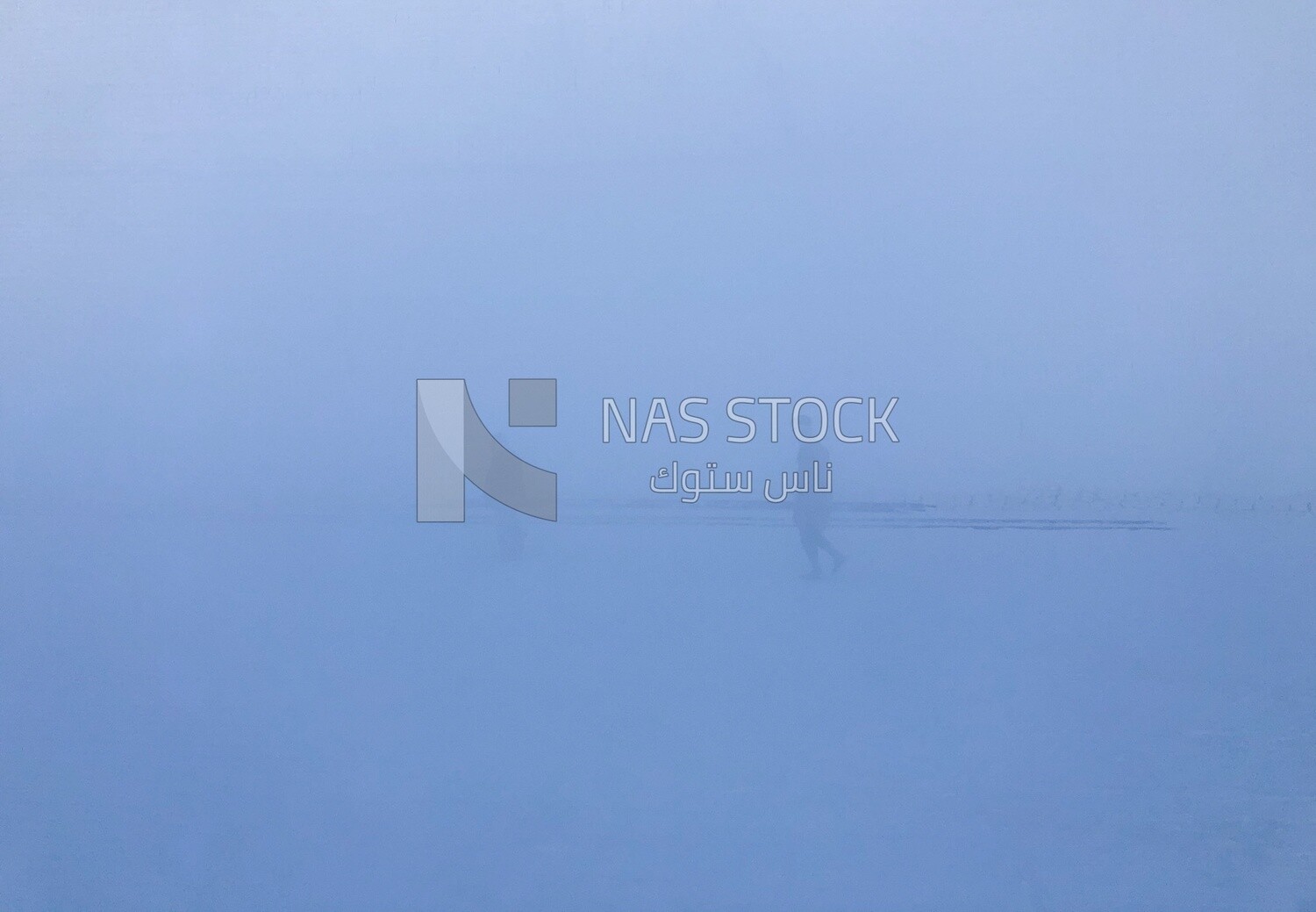 A scene of thick fog covering the place and the workers