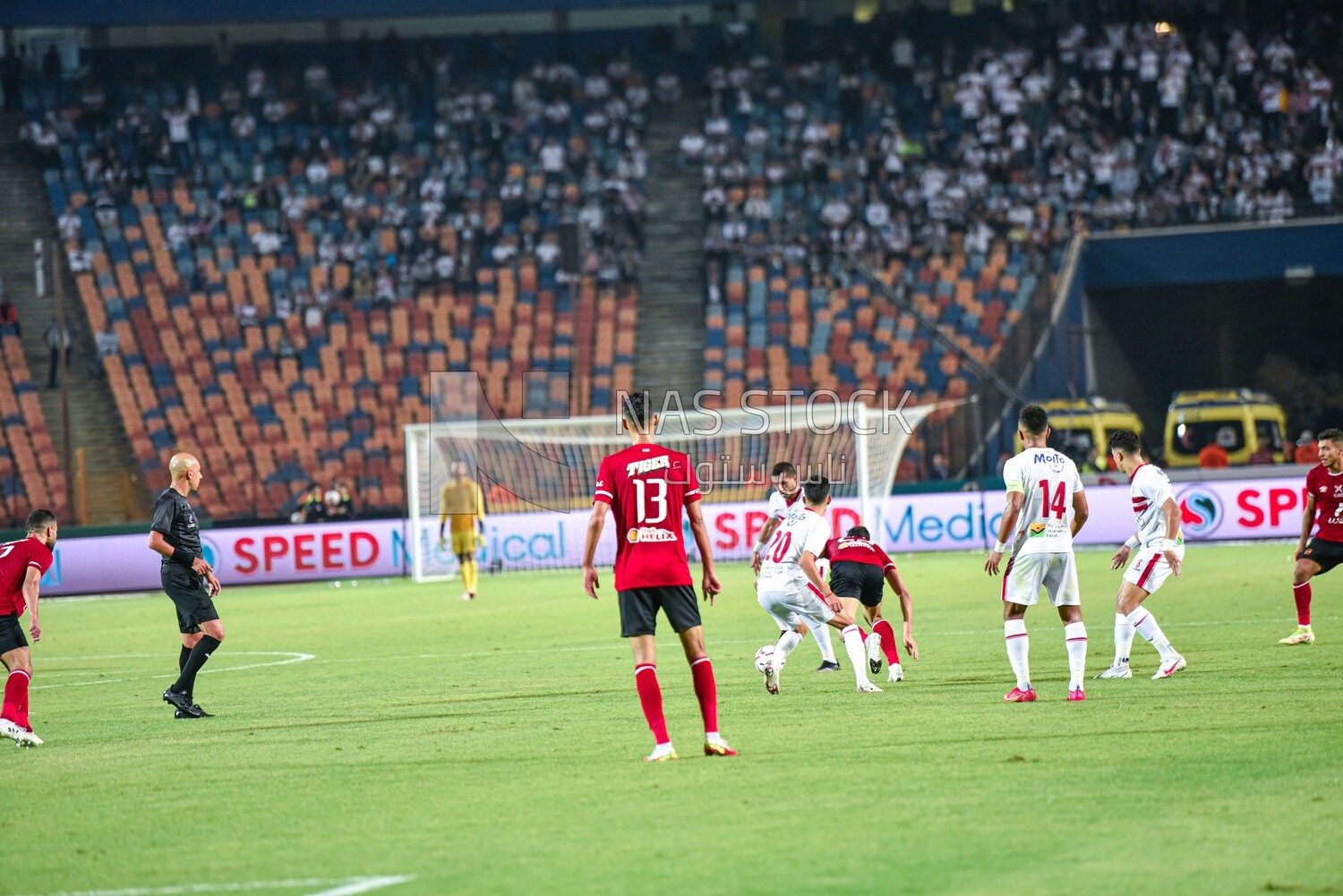 Two football teams are competing for the ball