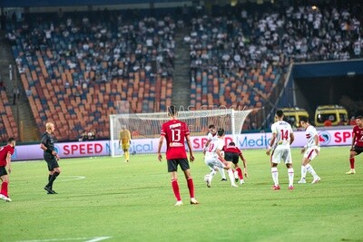 Two football teams are competing for the ball
