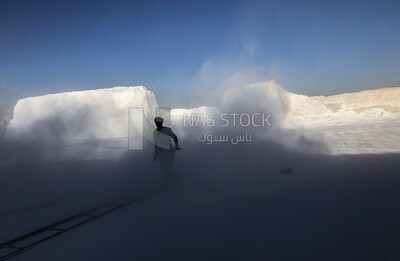 A scene of a craftsman working in the mist outside a brickyard