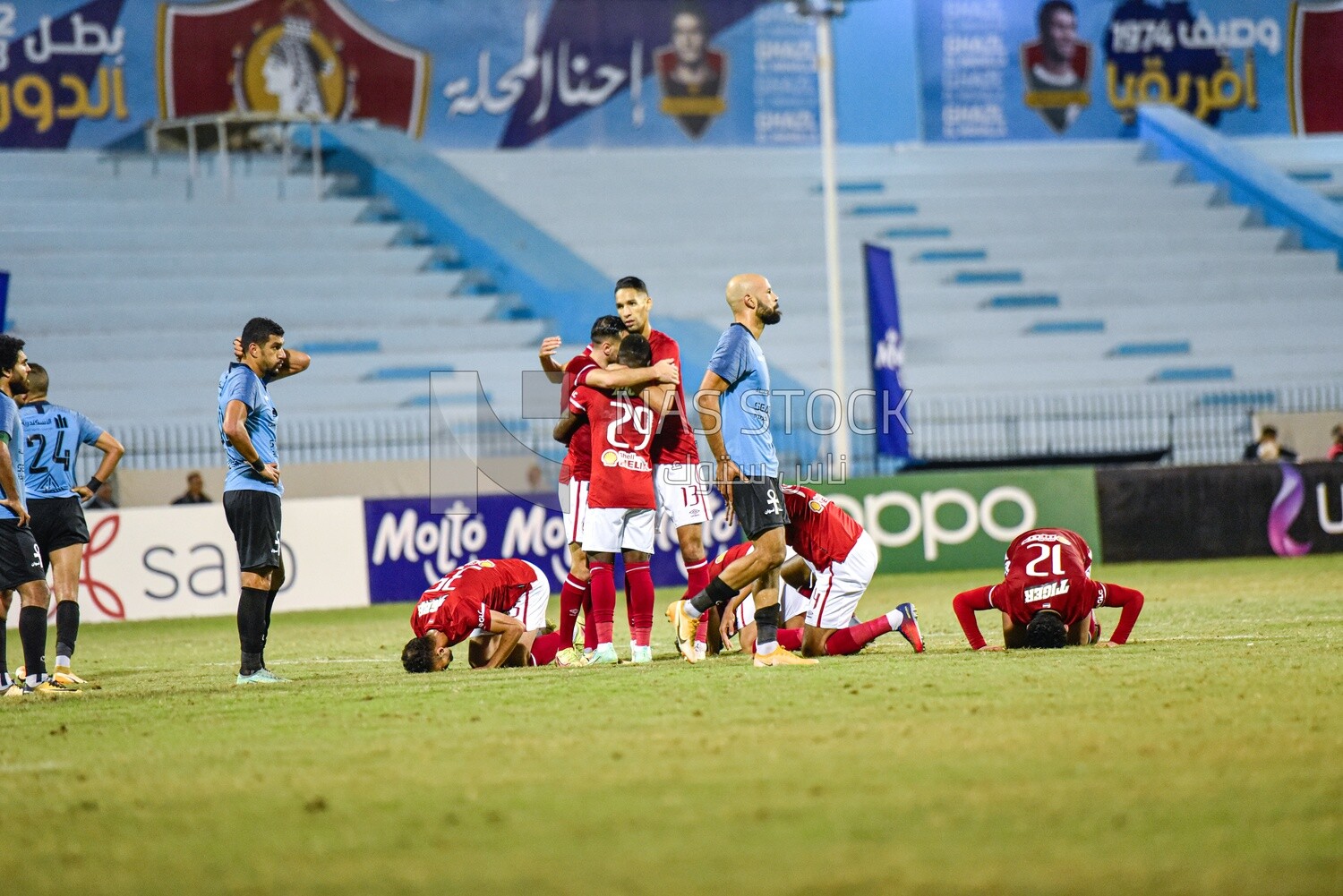 Football team celebrates after scoring a goal