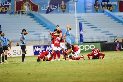 Football team celebrates after scoring a goal
