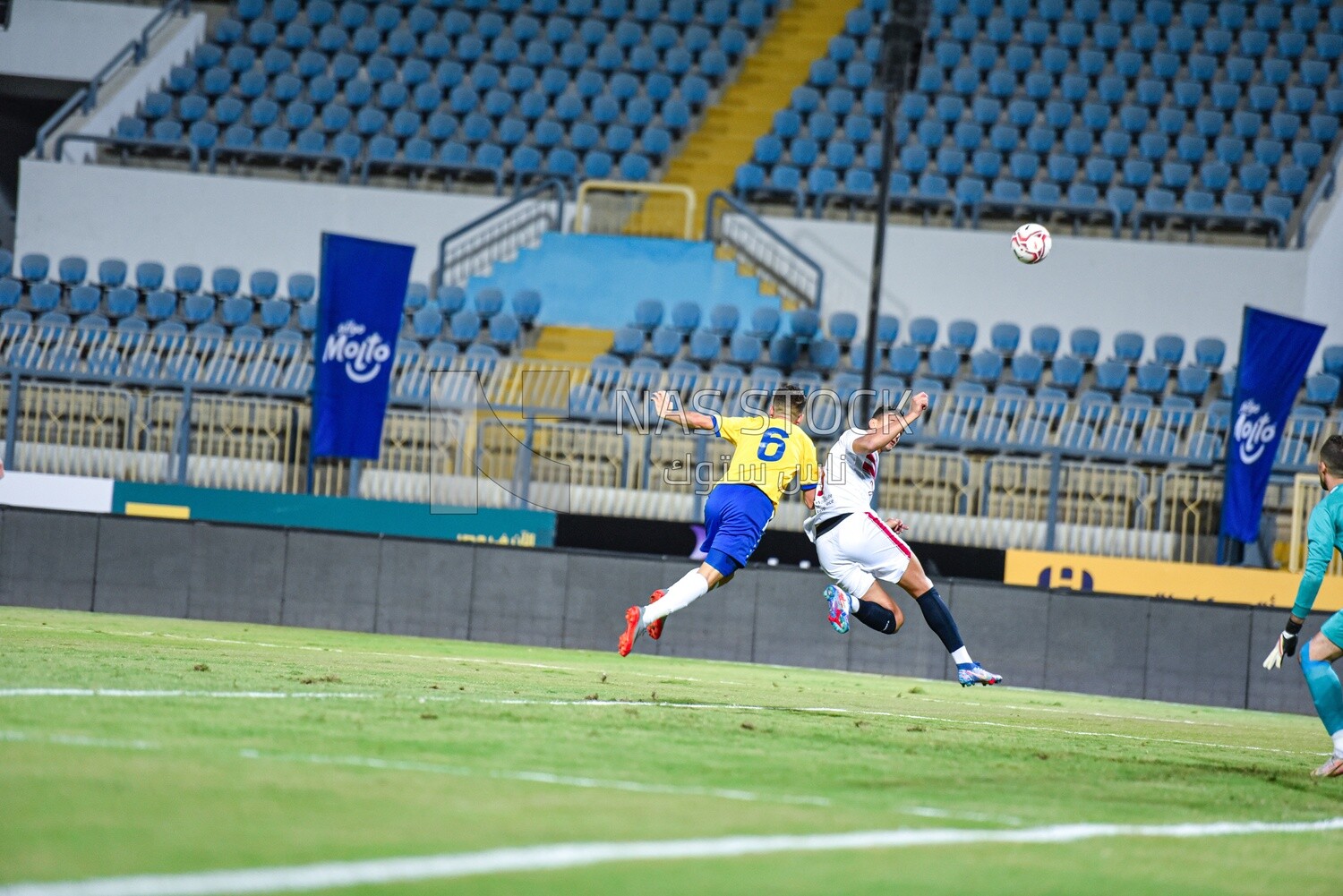 Two football teams are competing for the ball