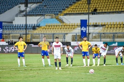 Football player preparing to score a penalty kick