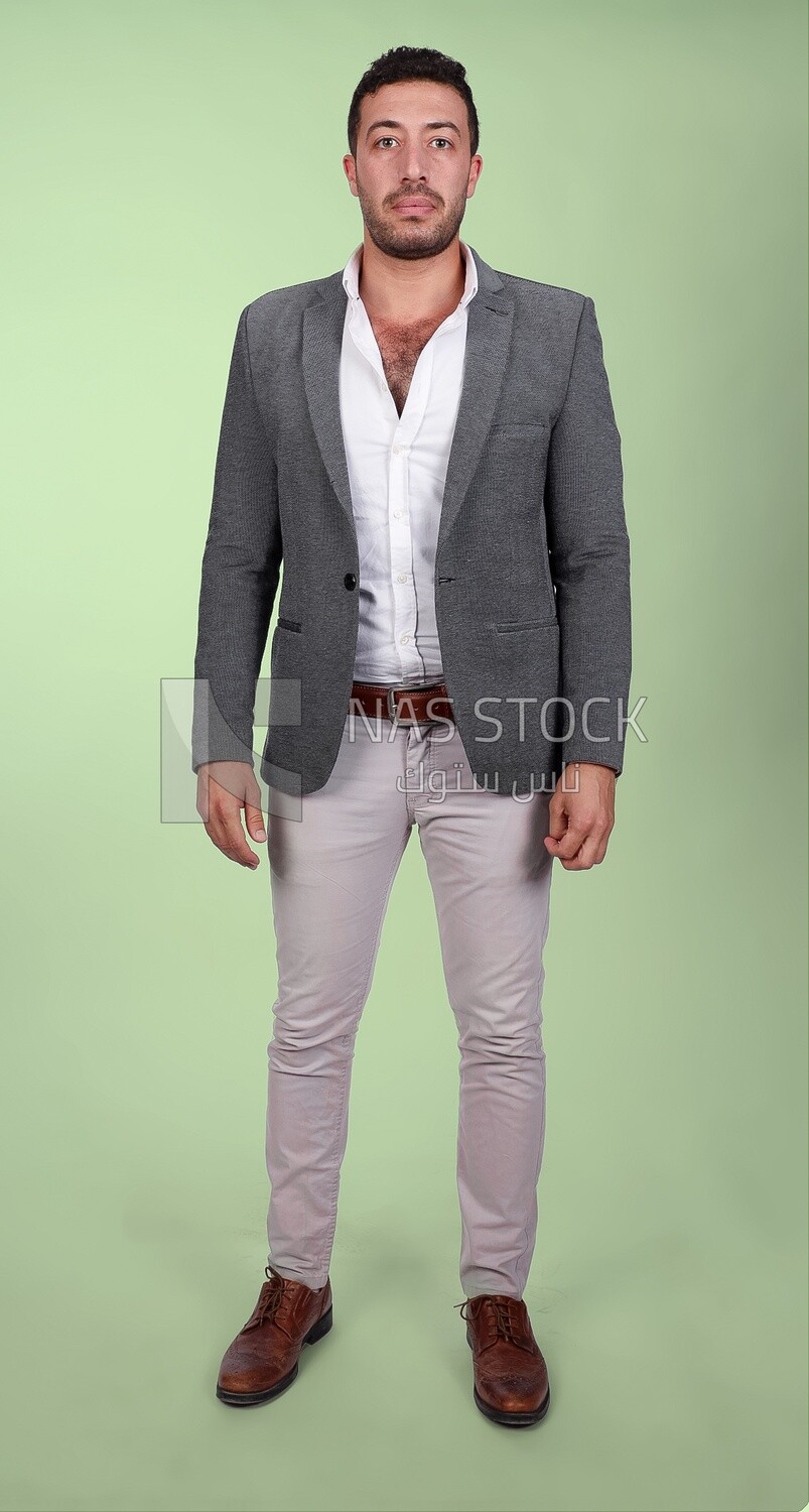 Photo of a man standing wearing a formal suit, business development and partnerships, business meeting, Model
