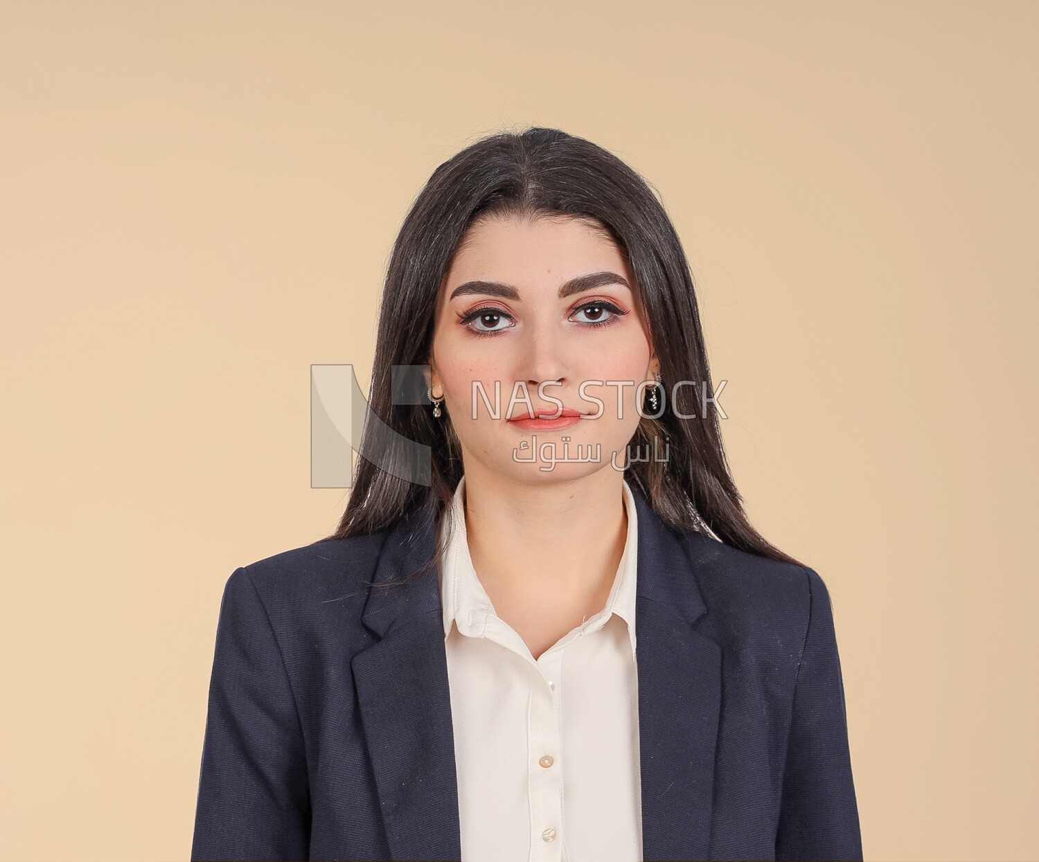 Portrait of a businesswoman standing, meeting at the workplace, discussing work tasks, taking notes on the board