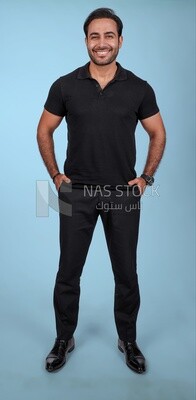 Photo Of a Handsome man Standing, Smiling Man, Wearing Casual Clothes Posing In a Light Room Interior, Smiling At the Camera
