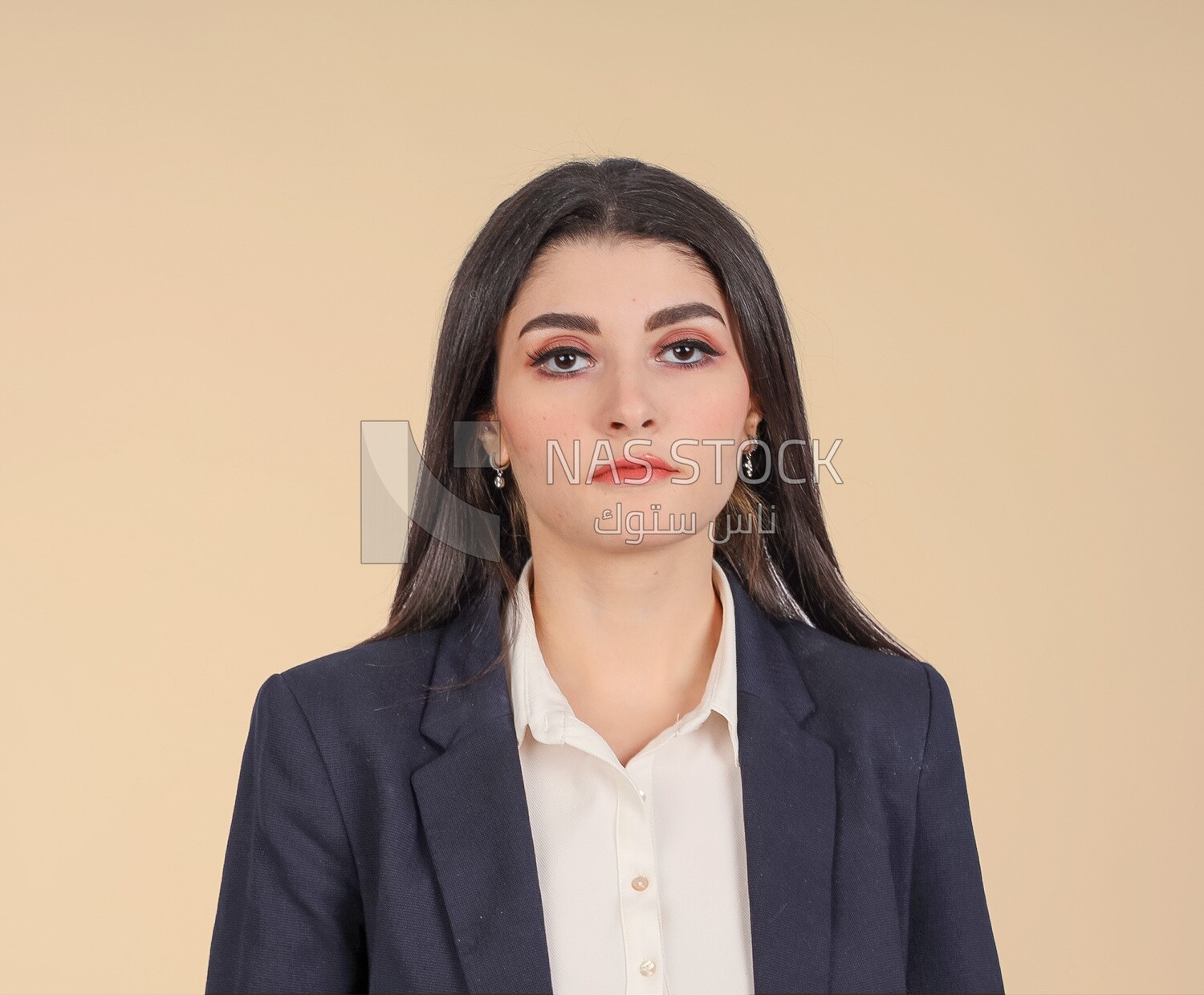 Portrait of a businesswoman standing, meeting at the workplace, discussing work tasks, taking notes on the board