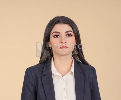 Portrait of a businesswoman standing, meeting at the workplace, discussing work tasks, taking notes on the board