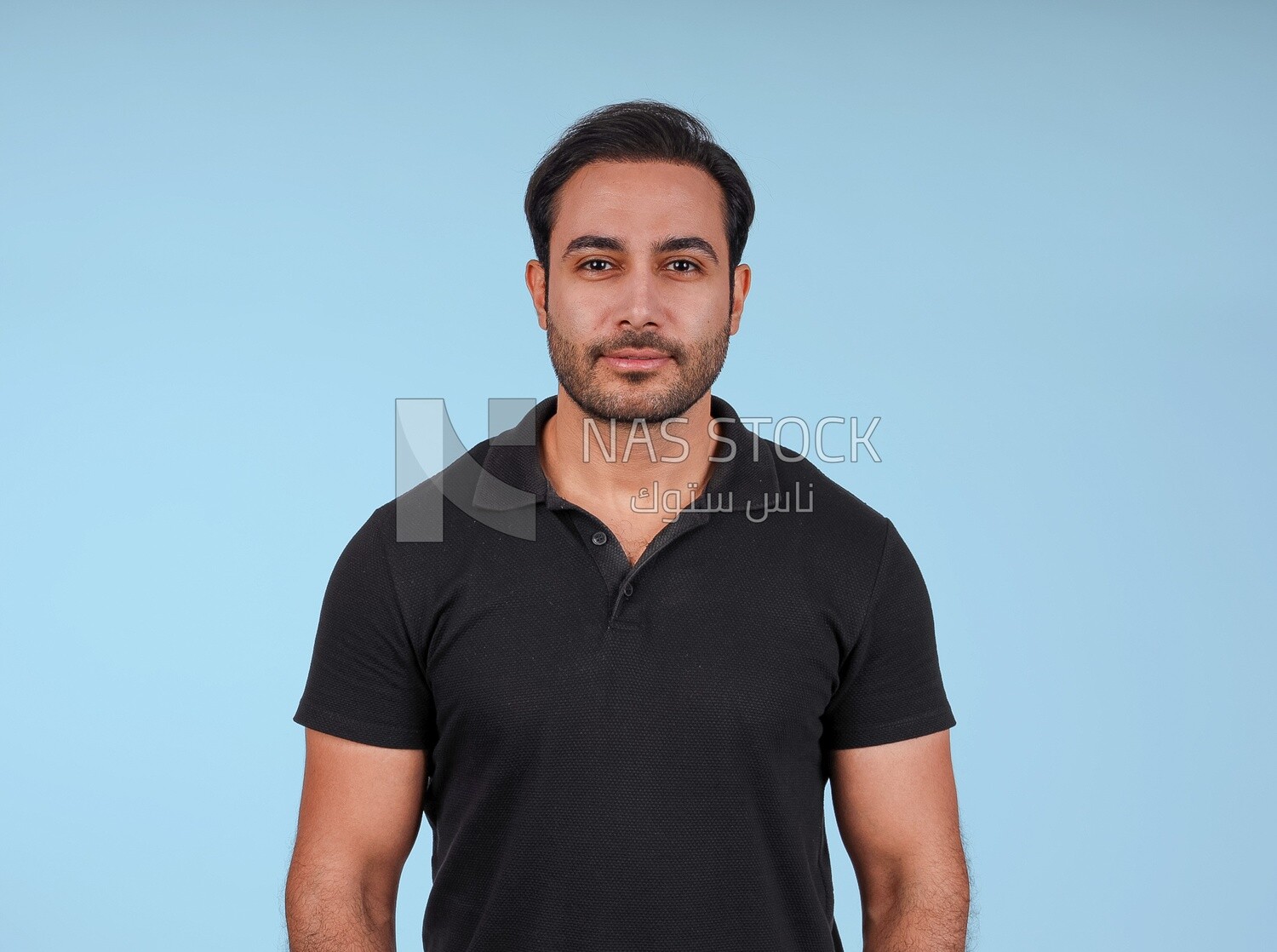 Portrait Of Handsome man Standing, Smiling Man, Wearing Casual Clothes Posing In a Light Room Interior, Smiling At the Camera
