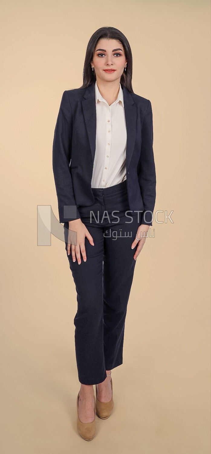 Photo of a businesswoman standing, meeting at the workplace, discussing work tasks, taking notes on the board