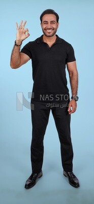 Photo Of a Handsome man Standing with hand gesture, Smiling Man, Wearing Casual Clothes Posing In a Light Room Interior, Smiling At the Camera