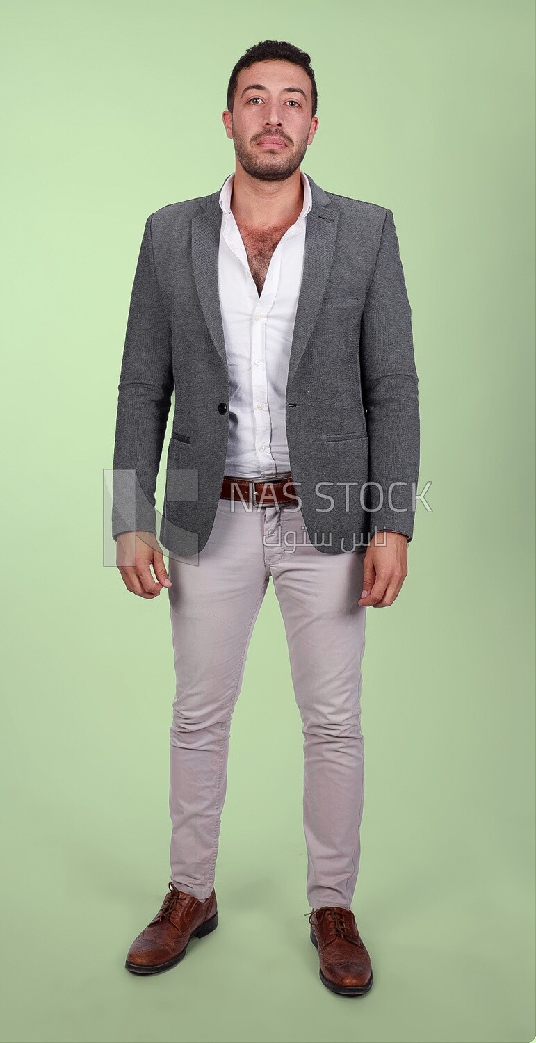 Photo of a man standing wearing a formal suit, business development and partnerships, business meeting, Model