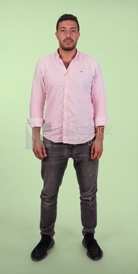 Photo Of Handsome man Standing, Smiling Man, Wearing Casual Clothes Posing In a Light Room Interior, Smiling At the Camera, looking away