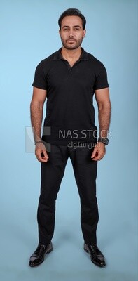 Photo Of a Handsome man Standing, Smiling Man, Wearing Casual Clothes Posing In a Light Room Interior, Smiling At the Camera