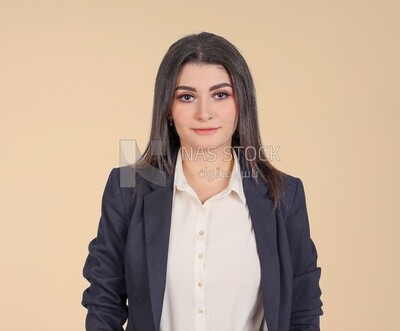 Portrait of a businesswoman standing, meeting at the workplace, discussing work tasks, taking notes on the board