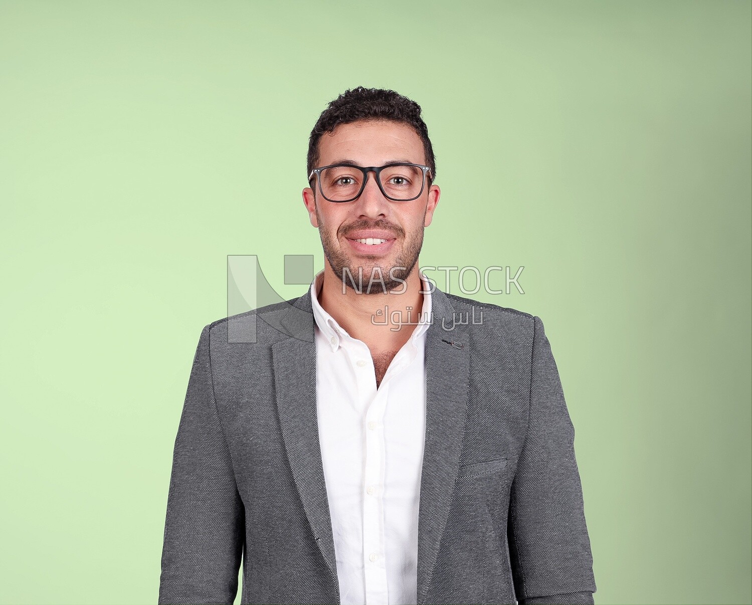 Portrait of a handsome man standing with glasses wearing a formal suit, business development and partnerships, business meeting, Model