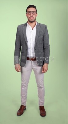 Photo of a handsome man standing with glasses wearing a formal suit, business development and partnerships, business meeting, Model