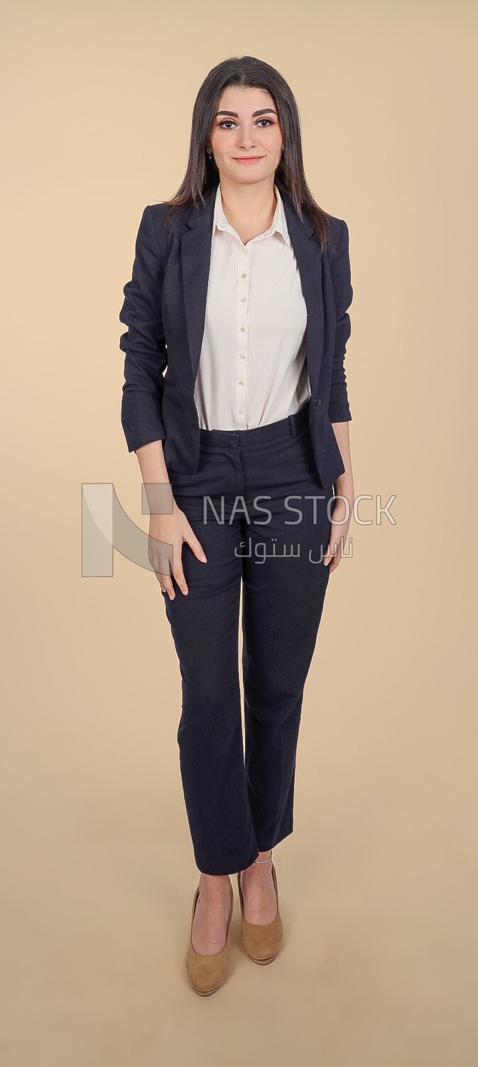 Photo of a businesswoman standing, meeting at the workplace, discussing work tasks, taking notes on the board