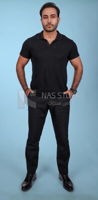 Photo Of a Handsome man Standing, Smiling Man, Wearing Casual Clothes Posing In a Light Room Interior, Smiling At the Camera