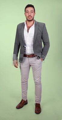 Photo of a man standing wearing a formal suit puts his hand on his pocket, business development and partnerships, business meeting, Model