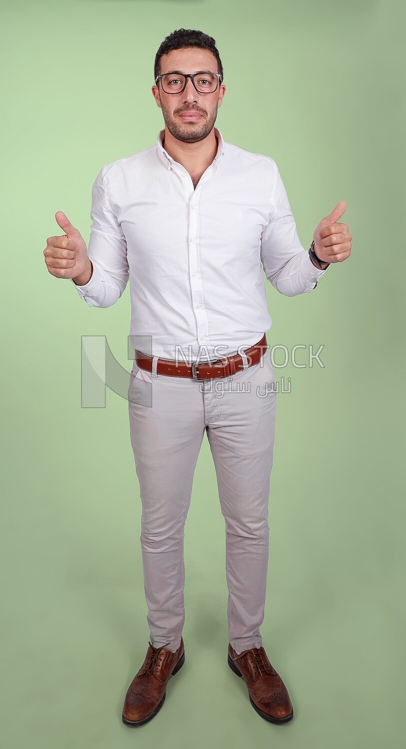 Photo of a handsome man with glasses standing with thumb up hands, business development and partnerships, business meeting, Model