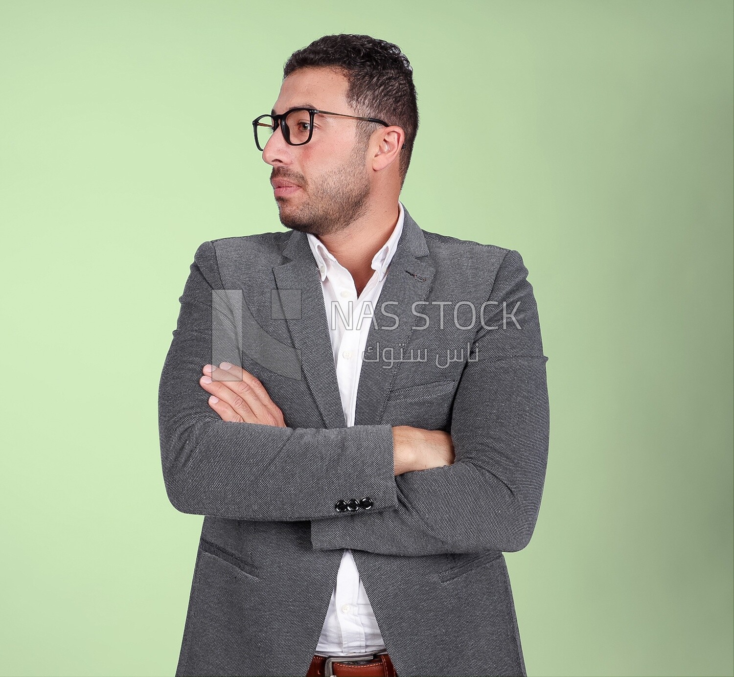Portrait of a handsome man standing with glasses wearing a formal suit looking away, business development and partnerships, business meeting, Model