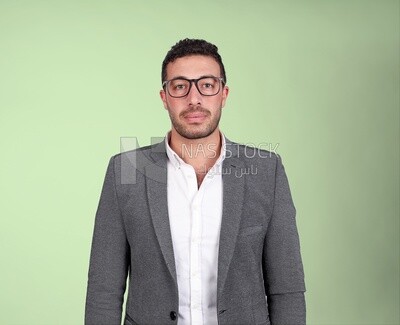 Portrait of a handsome man standing with glasses wearing a formal suit, business development and partnerships, business meeting, Model