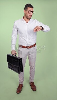 Photo of a handsome man wearing glasses and holding a leather bag and looking at the watch, business and partnership development, business meeting, model