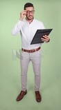 Photo of a handsome man with glasses and reading from a paper clipboard, business development and partnerships, business meeting, Model