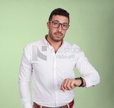 Photo of a handsome man wearing glasses looking at the watch, business and partnership development, business meeting, model