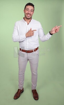Portrait of a man wearing formal wear pointing away, business development and partnerships, business meeting, Model