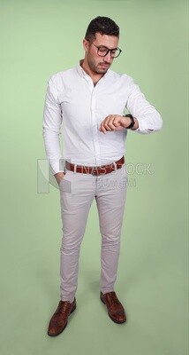 Photo of a handsome man wearing glasses looking at the watch, business and partnership development, business meeting, model