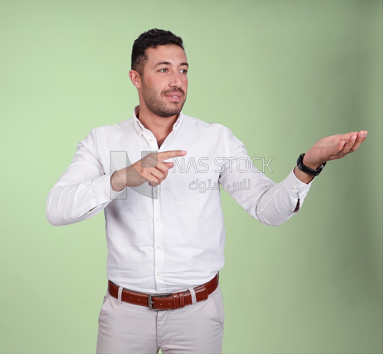 Portrait of a man wearing formal wear pointing away, business development and partnerships, business meeting, Model