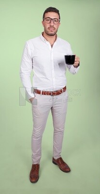Photo of a handsome man wearing glasses and standing holding a cup of coffee, business development and partnerships, business meeting, model
