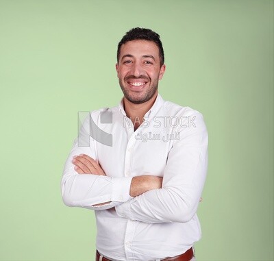 Portrait of a handsome man standing wearing formal wear with crossed hands, business development and partnerships, business meeting, Model