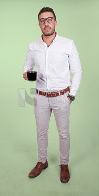 Photo of a handsome man wearing glasses and standing holding a cup of coffee, business development and partnerships, business meeting, model