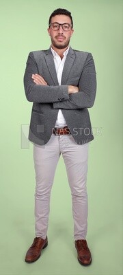 Portrait of a handsome man standing wearing formal wear with crossed hands, business development and partnerships, business meeting, Model