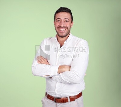 Portrait of a handsome man standing wearing formal wear with crossed hands, business development and partnerships, business meeting, Model